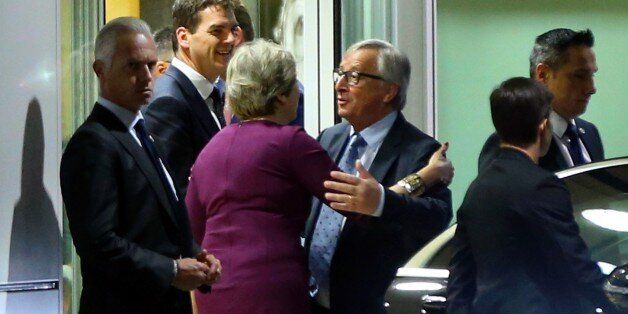 BRUSSELS, BELGIUM - OCTOBER 16: European Commission President Jean-Claude Juncker sends off British Prime Minister Theresa May and British Secretary of State for Exiting the European Union (Brexit Minister) David Davis after their meeting at the European Commission building in Brussels, Belgium on October 16, 2017. (Photo by Dursun Aydemir/Anadolu Agency/Getty Images)