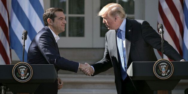 WASHINGTON, DC - OCTOBER 17: U.S. President Donald Trump (R) and Greek Prime Minister Alexis Tsipras shake hands during a joint press conference in the Rose Gard at the White House October 17, 2017 in Washington, DC. A left-wing socialist, Tsipras was critical of Trump during his 2016 presidential campaign. But with tension high between the U.S. and Turkey, Trump and Tsipras are looking for renewed ties as they discuss defense, economic issues, energy security and cultural ties, according to the White House. (Photo by Chip Somodevilla/Getty Images)