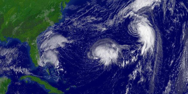 This National Oceanic and Atmospheric Administration (NOAA) satellite image shows Tropical Storm Ophelia, Hurricane Nate and Hurricane Maria churning over the Atlantic Ocean at 0915 EDT (1315 GMT) September 7, 2005. FOR EDITORIAL USE ONLY REUTERS/NOAA/Handout M/KS