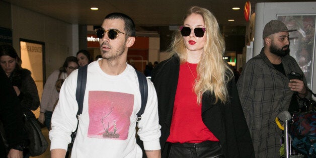 PARIS, FRANCE - MARCH 06: (L-R) Singer Joe Jonas and actress Sophie Turner arrive at Aeroport Roissy - Charles de Gaulle on March 6, 2017 in Paris, France. (Photo by Marc Piasecki/GC Images)