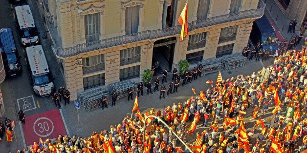 BARCELONA, CATALONIA, SPAIN - 2017/10/08: General view of the VÃa Laietana street full of protesters during the demonstration by the unit of Spain.Thousands of people protested on Sunday in Barcelona against the independence movement in a march that has been organised by the Societ at Civil Catalana. Catalonia's president Carles Puigdemont will address the Catalan Parliament on 10th October to discuss the result of the referendum that was held on October 1. Civil Catalan society the entity th