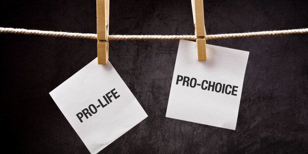 Pro-life vs pro-choice, female right on abortion concept