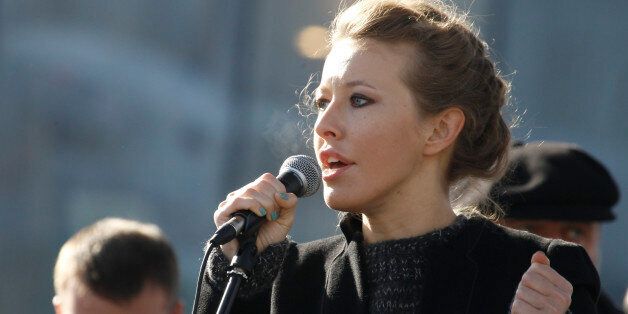 Television host and opposition activist Ksenia Sobchak delivers a speech during a demonstration for fair elections on Novy Arbat Street in central Moscow March 10, 2012. Several thousand Russians gathered in central Moscow on Saturday for a rally seen as a test of the opposition's ability to mount a sustained challenge to President-elect Vladimir Putin. REUTERS/Sergei Karpukhin (RUSSIA - Tags: POLITICS CIVIL UNREST ELECTIONS)