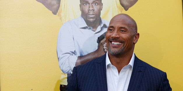 Cast member Dwayne Johnson poses at the premiere of the movie