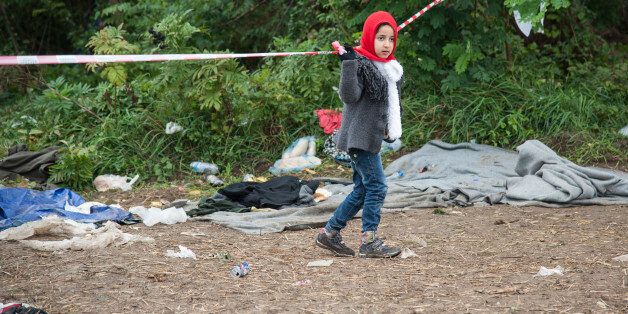 SERBIAN-CROATIAN BORDER, BAPSKA, SYRMIA, CROATIA - 2015/09/23: A child on the path leading to the Serbian-Croatian border. More refugees continue to arrive in Europe due to persecution and poverty in their homeland. (Photo by Ivan Romano/Pacific Press/LightRocket via Getty Images)