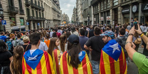 BARCELONA, CATALONIA, SPAIN - 2017/10/03: Independence youth marching down on Via Laietana to the Parliament of Catalonia.Continuous demonstrations are still carried out in the central artery of Barcelona, Via Laietana. The popular street passes in front of the Spanish national police headquarters in Barcelona. (Photo by Paco Freire/SOPA Images/LightRocket via Getty Images)