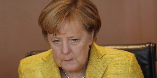 BERLIN, GERMANY - SEPTEMBER 27: German Chancellor Angela Merkel (CDU) arrive for the weekly government cabinet meeting in the german chancellery on September 27, 2017 in Berlin, Germany. (Photo by Michele Tantussi/Getty Images)