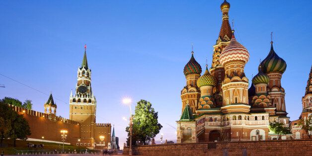 The buildings located on the Red Square: Kremlin wall (at left) and Saint Basil's Cathedral (at right), Moscow, Russia. UNESCO World Heritage Site