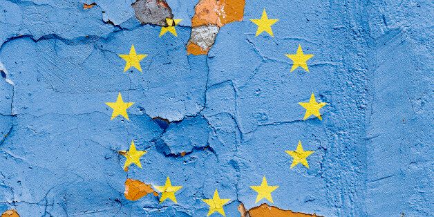 European Union flag painted on a brick wall. Flag of European Union. Textured abstract background