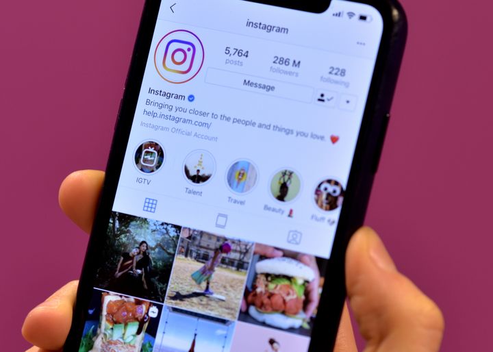 Stock photo of the home page of social media site Instagram on a smartphone.