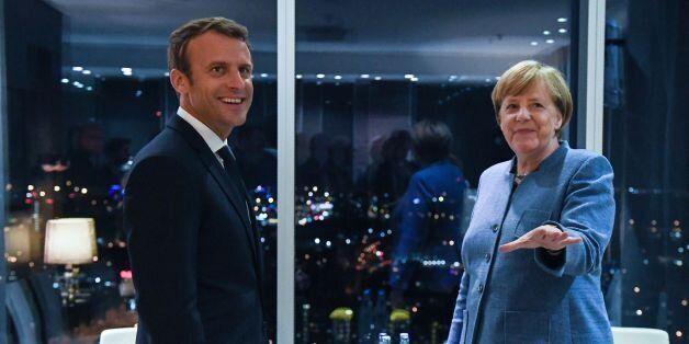 France's President Emmanuel Macron (L) meets with Germany's Chancellor Angela Merkel on the eve of the European Union Digital Summit in Tallinn on September 28, 2017.European Union leaders meet for an informal dinner ahead of full summit on Friday. Talks are expected to feature reactions to French President Emmanuel Macron's speech outlining his new vision for Europe, and discussions on digital issues, a priority for host Estonia. / AFP PHOTO / JANEK SKARZYNSKI (Photo credit should read
