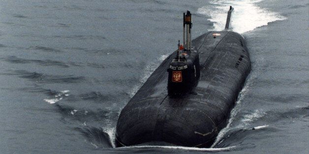 376161 03: (UNDATED FILE PHOTO) The Russian nuclear submarine 'Kursk' motoring in the Barents Sea near Severomorsk, Russia. The 'Kursk', one of the biggest and newest submarines in the Russian Navy, is trapped at a depth of 354 feet, above the Arctic Circle in the Barents Sea and rescue attempts continue August 16, 2000. (Photo by Oleg Nikishin/Newsmakers)