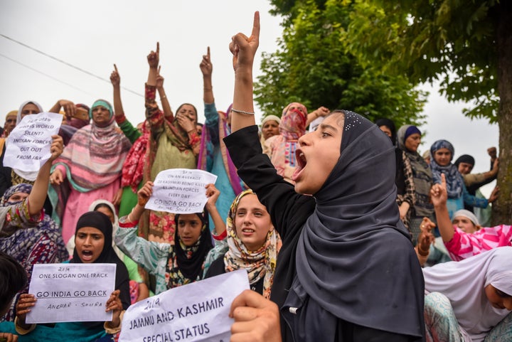 Kashmiri women chant slogans during the protest in Srinagar's Soura on August 31.