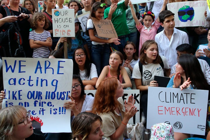 Swedish environmental activist Greta Thunberg, center, participates in a youth climate strike outside the United Nations, on Aug. 30, 2019 in New York. 