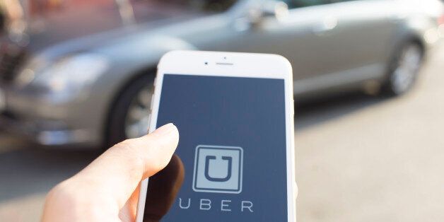 HONG KONG, HONG KONG - AUGUST 31: The startup screen of Uber, car transportation mobile app developed by the American technology company Uber Technologies Inc, pictured on the display of an iphone 6s plus, on 31 August 2017 in Hong Kong, Hong Kong. (Photo by studioEAST/Getty Images)