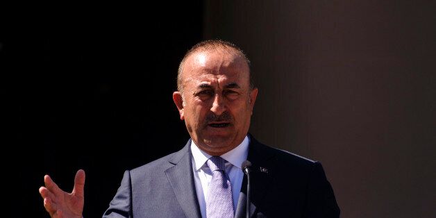 Turkish Foreign Minister Mevlut Cavusoglu speaks during a joint press conference with Turkish Cypriot leader Mustafa Akinci after a meeting on June 1, 2017, in the northern part of Nicosia, in the self proclaimed Turkish Republic of Northern Cyprus (TRNC). / AFP PHOTO / Iakovos Hatzistavrou (Photo credit should read IAKOVOS HATZISTAVROU/AFP/Getty Images)
