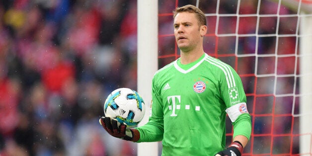 MUNICH, GERMANY - SEPTEMBER 16: Goalkeeper Manuel Neuer of FC Bayern Muenchen holds the ball during the Bundesliga match between FC Bayern Muenchen and 1. FSV Mainz 05 at Allianz Arena on September 16, 2017 in Munich, Germany. (Photo by Sebastian Widmann/Bongarts/Getty Images)