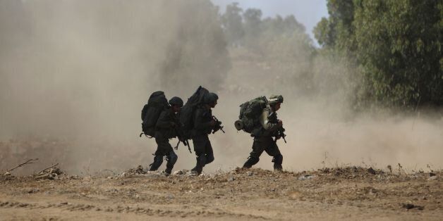 Israeli soldiers take part in a military exercise simulating conflict with Lebanese movement Hezbollah, in the Israeli annexed Golan Heights, near the Syrian border on September 5, 2017, in what would be the largest drill in nearly two decades.The drill will last 10 days and simulate 'scenarios we'll be facing in the next confrontation with Hezbollah', a defence source said, referring to the Iran-backed Shiite movement. / AFP PHOTO / JALAA MAREY (Photo credit should read JALAA MAREY/AFP/Getty Images)