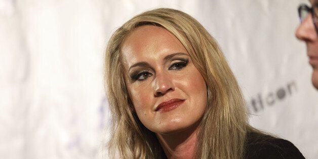 Political commentator Scottie Nell Hughes listens during the Politicon convention inside the Pasadena Convention Center in Pasadena, California, U.S., on Saturday, July 29, 2017. During the third annual Politicon pundits, politicians, comedians and entertainers gather to discuss issues that touch all sides of the political spectrum. Photographer: Patrick T. Fallon/Bloomberg via Getty Images