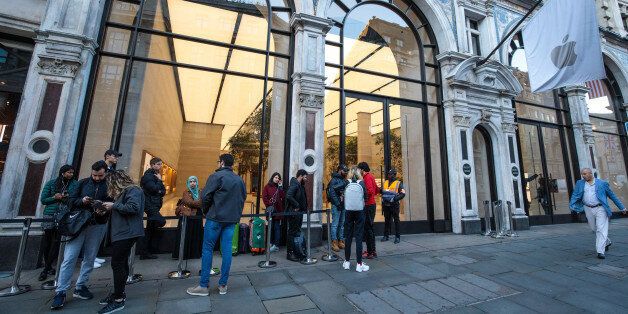 LONDON, ENGLAND - SEPTEMBER 22: Customers queue outside Apple Regent Street ahead of the launch of the iPhone 8 on September 22, 2017 in London, England. Apple have today launched their new mobile phone, the iPhone 8 and 8 plus in the UK today ahead of the iPhone X's release in November. (Photo by Jack Taylor/Getty Images)