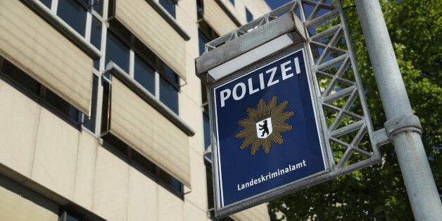 BERLIN, GERMANY - MAY 18: A sign hangs outside the headquarters of the Berlin state crime bureau (Landeskriminalamt) on May 18, 2017 in Berlin, Germany. Police are investigating a possible cover-up at the Berlin Landeskriminalamt related to the Anis Amri terror case. According to Berlin state Interior Minister Andreas Geisel, documents in the Anis Amri file indicate that he was under surveillance before the attack and that investigators had sufficient evidence against him relating to drug dealing charges to make an arrest, though that files were altered by police after the terror attack in order to cover up the failure to arrest Amri before. Amri drove a truck into a crowded Christmas market in Berlin last December, killing nine people. (Photo by Sean Gallup/Getty Images)