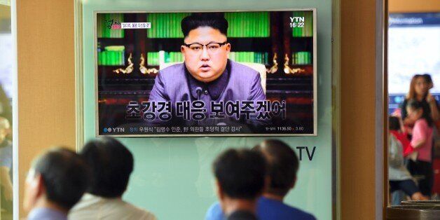 People watch a television news screen showing a picture of North Korean leader Kim Jong-Un delivering a statement in Pyongyang, at a railway station in Seoul on September 22, 2017. US President Donald Trump is 'mentally deranged' and will 'pay dearly' for his threat to destroy North Korea, Kim Jong-Un said on September 22, as his foreign minister hinted the regime may explode a hydrogen bomb over the Pacific Ocean. / AFP PHOTO / JUNG Yeon-Je (Photo credit should read JUNG YEON-JE/AFP/Getty Images)