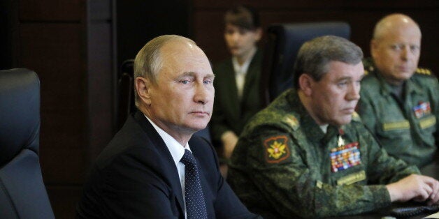 LENINGRAD REGION, RUSSIA - SEPTEMBER 18, 2017: Russia's President Vladimir Putin and Russia's First Deputy Defense Minister, Chief of the General Staff of the Russian Armed Forces Valery Gerasimov (L-R) attend the main stage of Zapad 2017, joint Russian and Belarusian military exercises, at Luzhsky range. Mikhail Metzel/TASS (Photo by Mikhail Metzel\TASS via Getty Images)