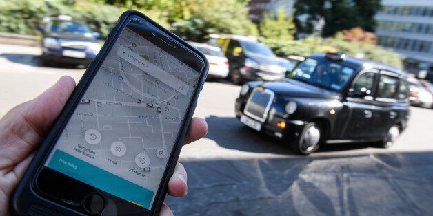LONDON, ENGLAND - SEPTEMBER 22: In this Photo Illustration, a phone displays the Uber ride-hailing app on September 22, 2017 in London, England. The Transport Regulator has announced that it will not re-new the company's licence to operate in London as it's current service is 'not fit and proper'. (Photo by Leon Neal/Getty Images)