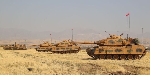 Turkish tanks are seen near the Habur crossing gate between Turkey and Iraq during a military drill on September 18, 2017. Turkey launched a military drill featuring tanks close to the Iraqi border the army said, a week before Iraq's Kurdish region will hold an independence referendum on September 25. / AFP PHOTO / STR (Photo credit should read STR/AFP/Getty Images)