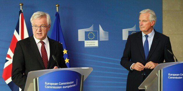 BRUSSELS, BELGIUM - SEPTEMBER 25 : Secretary of State for Exiting the European Union, David Davis (L) and Chief negotiator for the European Union, Michel Barnier (R) hold a joint press conference after they attended the fourth round of the Brexit negotiations in Brussels, Belgium on September 25, 2017. (Photo by Dursun Aydemir/Anadolu Agency/Getty Images)