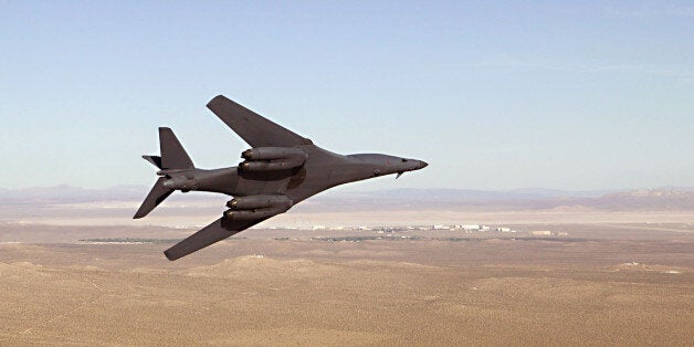 IN FLIGHT - OCTOBER 26: A B-1B Lancer gears its engines up as it attempts to set multiple international aircraft speed records during the 2003 Edwards Air Force Base Open House and Air Show October 26, 2003 during the 2003 Edwards Air Force Base Open House and Air Show. The B-1B set almost 50 world records during two flights at the event. (Photo by Steve Zapka/U.S. Air Force via Getty Images)