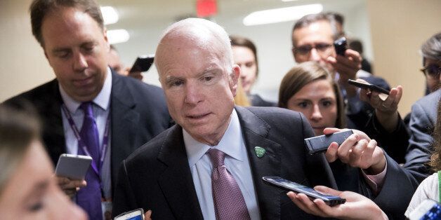 Senator John McCain, a Republican from Arizona and chairman of the Senate Armed Services Committee, speaks to members of the media in the basement of the U.S. Capitol in Washington, D.C., U.S., on Tuesday, Sept. 19, 2017. Senate Republicans making one last-ditch effort to repeal Obamacare have the daunting task of assembling 50 votes for an emotionally charged bill with limited details on how it would work, what it would cost and how it would affect health coverage -- all in 12 days. Photographer: Andrew Harrer/Bloomberg via Getty Images