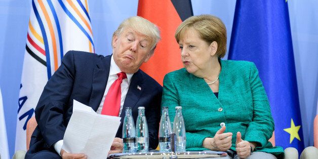 HAMBURG, GERMANY - JULY 08: US President, Donald Trump and German Chancellor Angela Merkel attend a panel discussion titled 'Launch Event Women's Entrepreneur Finance Initiative' on the second day of the G20 summit on July 8, 2017 in Hamburg, Germany. Leaders of the G20 group of nations are meeting for the July 7-8 summit. Topics high on the agenda for the summit include climate policy and development programs for African economies. (Photo by Ukas Michael - Pool/Getty Images)