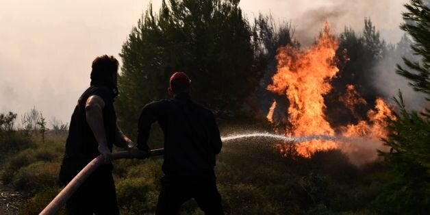 / AFP PHOTO / ARIS MESSINIS (Photo credit should read ARIS MESSINIS/AFP/Getty Images)