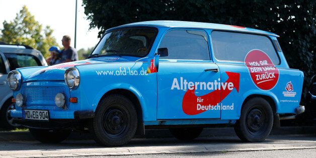 An AfD Party campaign Trabant car is seen before an election campaign rally of German Chancellor Angela Merkel, top candidate for the upcoming general elections of the Christian Democratic Union party (CDU), in Bitterfeld-Wolfen, Germany, August 29, 2017. REUTERS/Hannibal Hanschke