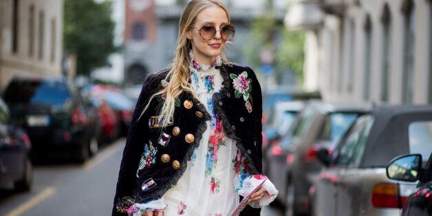 MILAN, ITALY - SEPTEMBER 24: Leonie Hanne wearing white dress, leather jacket, Dolce & Gabbana bag is seen outside Dolce & Gabbana during Milan Fashion Week Spring/Summer 2018 on September 24, 2017 in Milan, Italy. (Photo by Christian Vierig/Getty Images)