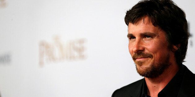 Cast member Christian Bale poses at the premiere of