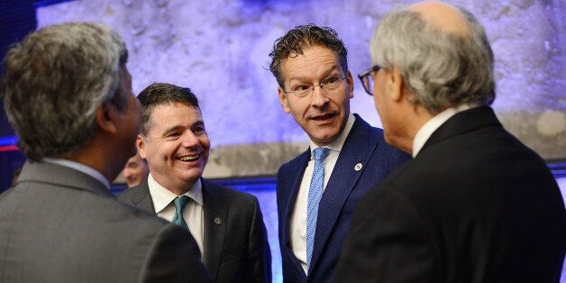 Paschal Donohoe, Ireland's finance minister, second left, and Jeroen Dijsselbloem, Dutch finance minister and head of the group of euro-area finance ministers, second right, speak to fellow attendees ahead of a Eurogroup meeting in Tallinn, Estonia, on Friday, Sept. 15, 2017. The monetary union is the core of a united Europe but at the same time we have the internal market for all 27, German Finance MinisterÂ Wolfgang SchaeubleÂ said.Â Photographer: Peti Kollanyi/Bloomberg via Getty Images