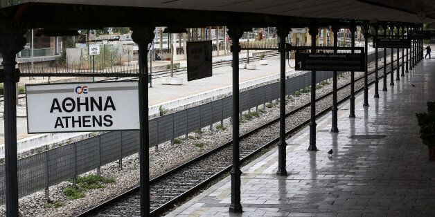 A man walks along an empty platform at a closed central train station during a 24-hour labour strike in Athens, Greece, on Wednesday, May 17, 2017. Greeces economy returned to recession in the first quarter as delays in concluding talks between the government and its creditors raised the specter of another debt drama. Photographer: Yorgos Karahalis/Bloomberg via Getty Images