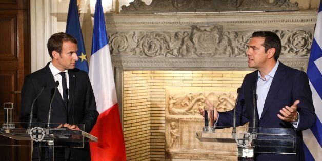 Greek Prime Minister Alexis Tsipras (2ndR) and French president Emmanuel Macron hold a joint press conference following their meeting in Athens on September 7, 2017, as part of a two-day official visit of the French president to Greece. / AFP PHOTO / ludovic MARIN (Photo credit should read LUDOVIC MARIN/AFP/Getty Images)