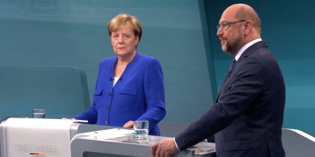A screen that shows the TV debate between German Chancellor Angela Merkel of the Christian Democratic Union (CDU) and her challenger Germany's Social Democratic Party SPD candidate for chancellor Martin Schulz in Berlin, Germany, September 3, 2017. German voters will take to the polls in a general election on September 24. REUTERS TV
