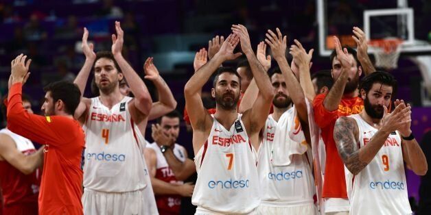 Spain's players celebrate after winning against Turkey at the end of the FIBA Eurobasket 2017 men's round 16 basketball match between Spain and Turkey at Sinan Erdem Sport Arena in Istanbul on September 10, 2017. / AFP PHOTO / OZAN KOSE (Photo credit should read OZAN KOSE/AFP/Getty Images)