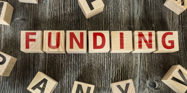 Wooden Blocks with the text: Funding