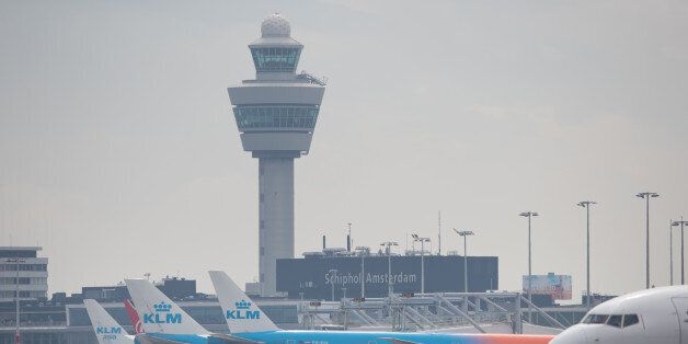 Passenger aircraft operated by KLM, the Dutch arm of Air France-KLM Group, stand at boarding gates at Schiphol airport in Amsterdam, Netherlands, on Tuesday, Aug. 15, 2017. Delta Air Lines Inc., China Eastern Airlines Corp. and Air France-KLM Group are reaching for their checkbooks to forge a deeper global alliance. Photographer: Jasper Juinen/Bloomberg via Getty Images