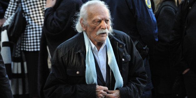 ATHENS, GREECE - NOVEMBER 22: World War II resistance hero Manolis Glezos leaves Aghios Dimitrios church in the Palaio Psychiko region of Athens after the funeral of former President Kostis Stephanopoulos on November 22, 2016 in Athens. (Photo by Nicolas Koutsokostas/Corbis via Getty Images)