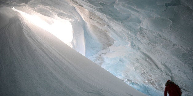 Russian President Vladimir Putin visits the cave of Arctic Pilots Glacier in Alexandra Land in remote Arctic islands of Franz Josef Land, Russia March 29, 2017. Sputnik/Alexei Druzhinin/Kremlin via REUTERS ATTENTION EDITORS - THIS IMAGE WAS PROVIDED BY A THIRD PARTY. EDITORIAL USE ONLY.