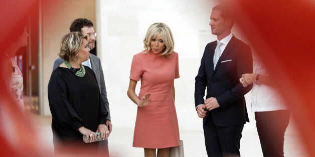 LUXEMBOURG - AUGUST 29: (R to L) Grand Duchess Maria Teresa of Luxembourg, Brigitte Macron-Trogneux, France's first lady and Luxembourg Prime Minister's husband Gauthier Destenay visit Luxembourg's Art Museum (Mudam) during a one day state visit on August 29, 2017 in Luxembourg, Luxembourg. (Photo by Sylvain Lefevre/WireImage)