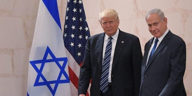 US President Donald Trump (L) arrives at the Israel Museum to speak in Jerusalem on May 23, 2017, accompanied by Israeli Prime Minister Benjamin Netanyahu. / AFP PHOTO / MANDEL NGAN (Photo credit should read MANDEL NGAN/AFP/Getty Images)