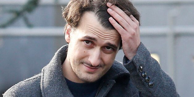 French journalist Loup Bureau reacts as he stands with supporters and family members after addressing media representatives after his arrival at Roissy-Charles de Gaulle Airport on the outskirts of Paris on September 17, 2017.A young French reporter who had been held on terror charges in Turkey, in a case that sparked tensions with France, arrived in Paris after being freed. / AFP PHOTO / GEOFFROY VAN DER HASSELT (Photo credit should read GEOFFROY VAN DER HASSELT/AFP/Getty Images)