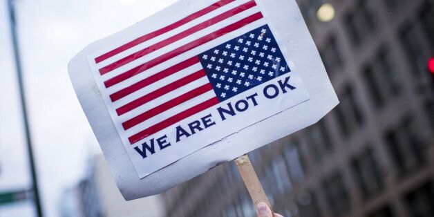 A placard is displayed in front of the U.S. Immigration and Customs Enforcement (ICE) headquarters at a rally to protest the end of the Deferred Action for Childhood Arrivals (DACA) program in Chicago, Illinois, U.S., on Tuesday, Sept. 5, 2017. President Donald Trump will end an Obama-era program preventing the deportation of immigrants illegally brought to the U.S. as children, U.S. Attorney Jeff Sessions said today, putting in legal limbo about 1 million people who consider themselves American